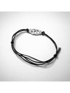 Partners in Crime Black Cord Bracelet with Silver Handcuff Charm